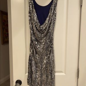 A beautiful sequence cocktail dress (w/lining) made in Italy/Milano; Size Small.